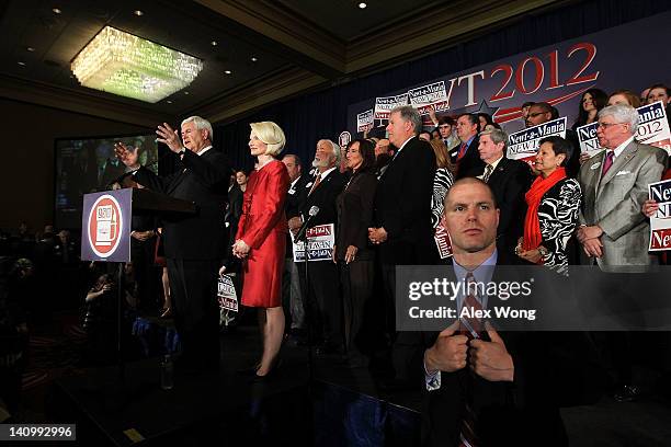 Republican presidential candidate and former Speaker of the House Newt Gingrich speaks as his wife Callista Gingrich listens after being declared the...