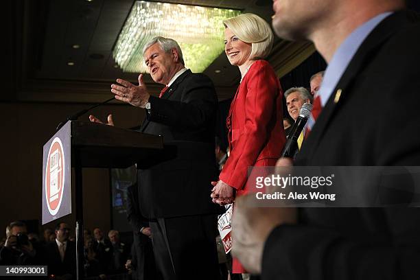 Republican presidential candidate and former Speaker of the House Newt Gingrich speaks as his wife Callista Gingrich listens after being declared the...
