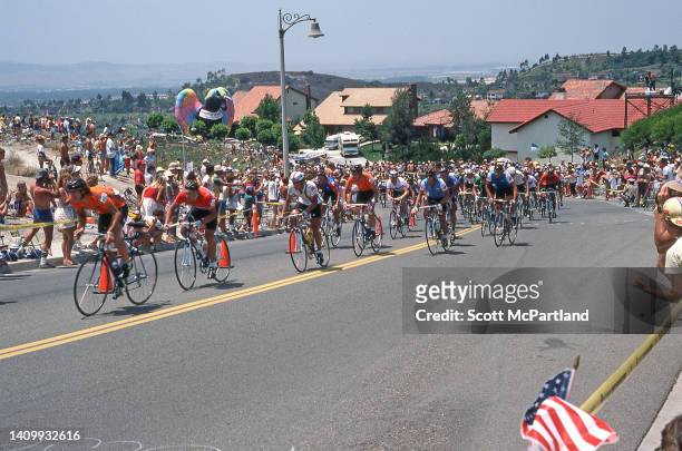 View of cyclists as they make their way along O'Neill Road during the Men's Cycling Road Race at the 1984 Summer Olympics, Mission Viejo, California,...