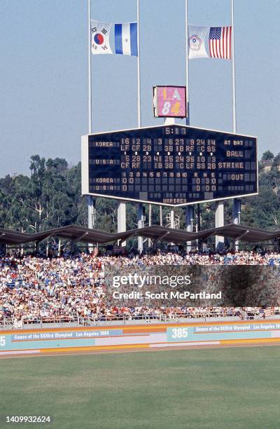 View of the scoreboard at Dodger Stadium during a baseball game between the United States and South Korea at the 1984 Summer Olympics, Los Angeles,...