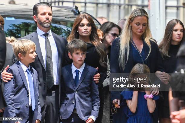 Donald Trump Jr. And Kimberly Guilfoyle arrive for the funeral of Ivana Trump at St. Vincent Ferrer Roman Catholic Church July 20, 2022 in New York...