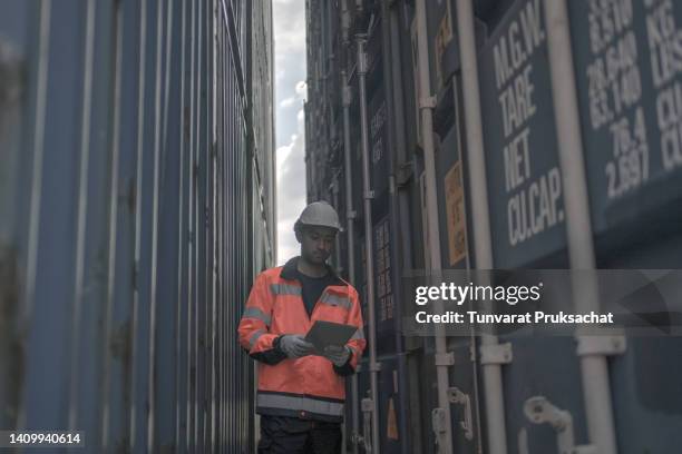 logistics engineer working at shipping port . - inventory management stock pictures, royalty-free photos & images