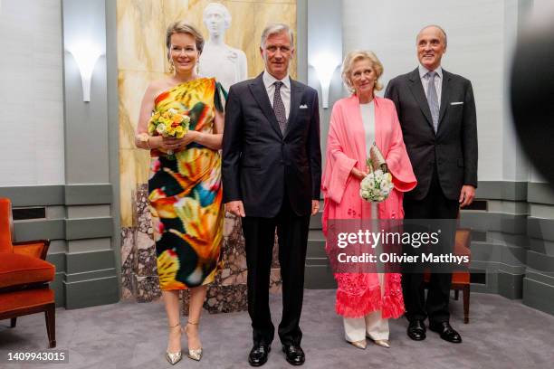 King Philippe and Queen Mathilde of Belgium flanked by Princess Astrid and Prince Lorenz pose for a family picture prior to attend the traditional...