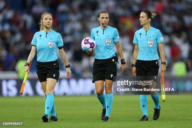 Match officials Manuela Nicolosi, Referee Stephanie Frappart and Elodie Coppola look on at half time during the UEFA Women's Euro 2022 Quarter Final...