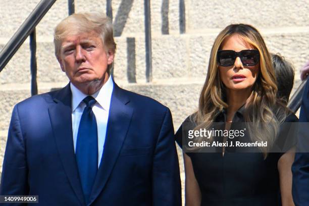Former President Donald J. Trump and Melania Trump exit the funeral of Ivana Trump at St. Vincent Ferrer Roman Catholic Church July 20, 2022 in New...