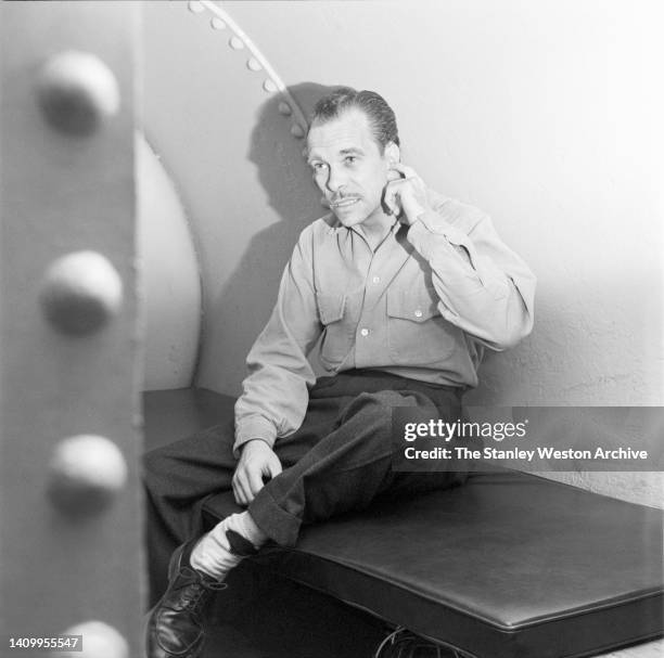 An unidentified sandhog sits inside a decompression chamber in a temporary medical clinic in the Lincoln Tunnel during construction of its third...