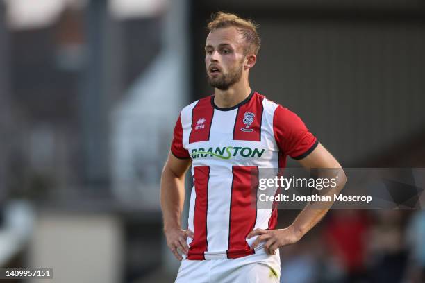 Charles Vernam of Lincoln City looks on during the Pre-Season Friendly between Grimsby Town FC and Lincoln City at Blundell Park on July 19, 2022 in...