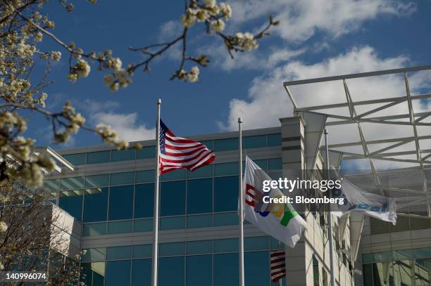 Flags stand in front of the EBay Inc. Headquarters in San Jose, California, U.S., on Tuesday, March 6, 2012. EBay has been bolstering ties with big...