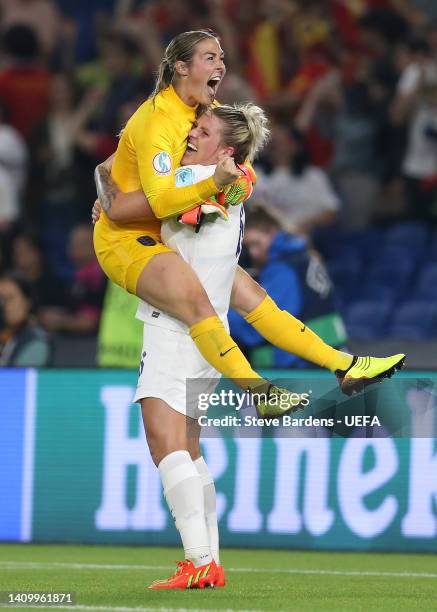 Mary Earps and Millie Bright of England celebrate after their sides victory during the UEFA Women's Euro 2022 Quarter Final match between England and...