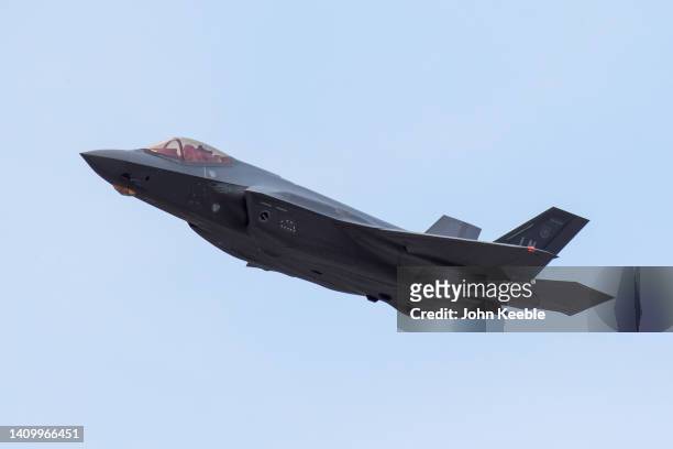 Performs a flypast during the Farnborough International Airshow 2022 on July 19, 2022 in Farnborough, England. Farnborough International Airshow 2022...
