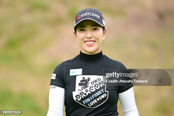 Ritsuko Ryu of Japan smiles after the birdie on the 10th green during the first round of Daito Kentaku eHeyanet Ladies at Takino Country Club on July...
