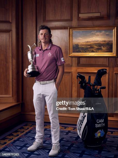 Cameron Smith of Australia poses with the Claret Jug in the clubhouse after winning The 150th Open at St Andrews Old Course on July 17, 2022 in St...