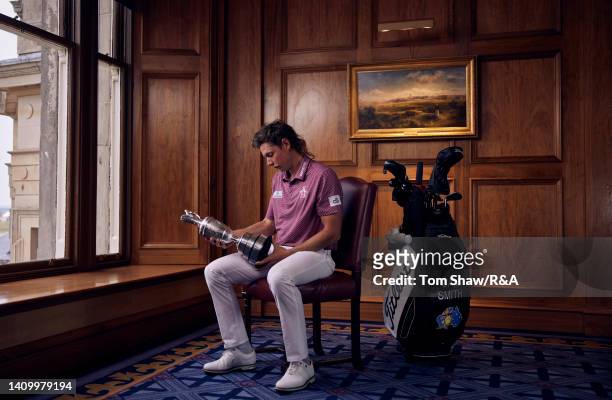 Cameron Smith of Australia poses with the Claret Jug in the clubhouse after winning The 150th Open at St Andrews Old Course on July 17, 2022 in St...
