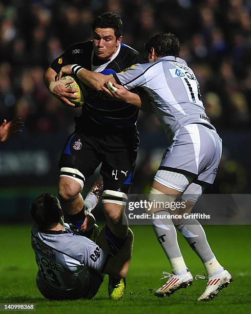 Francois Louw of Bath is tackled by Julian White of Leicester Tigers during the LV=Cup Semi Fianal match between Bath and Leicester Tigers at...