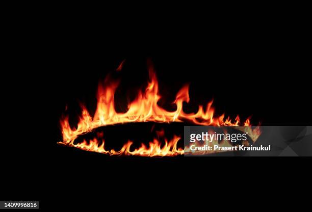 fire flames on black background - flame circle stock pictures, royalty-free photos & images