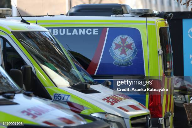 Ambulances are parked in front of the Royal Melbourne Hospital on July 21, 2022 in Melbourne, Australia. Victoria recorded 14,312 official cases of...