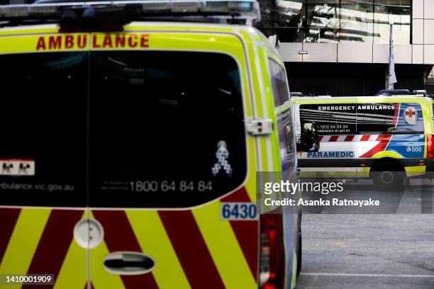 Ambulances are parked in front of the Royal Melbourne Hospital on July 21, 2022 in Melbourne, Australia. Victoria recorded 14,312 official cases of...