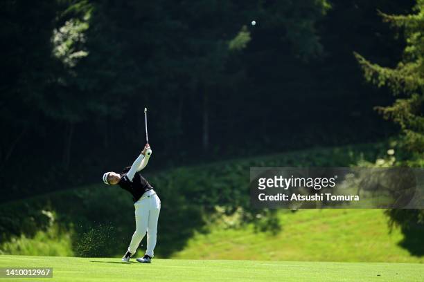 Rio Takeda of Japan hits her second shot on the 12th hole during the first round of Daito Kentaku eHeyanet Ladies at Takino Country Club on July 21,...