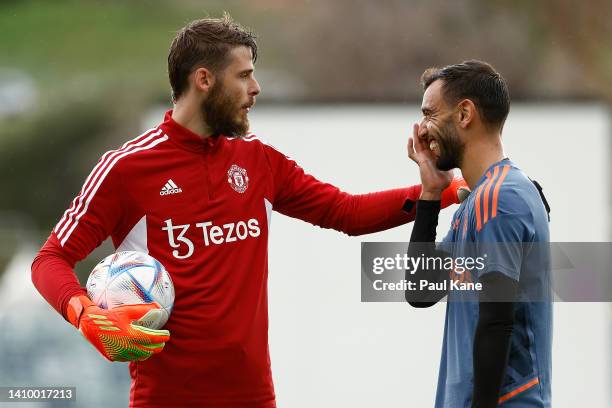 David de Gea and Bruno Fernandes of Manchester United talk during a Manchester United training session at the WACA on July 21, 2022 in Perth,...
