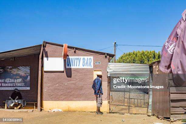 unity bar on claudius kandovazu street at wanaheda township in windhoek, namibia - southern africa stock pictures, royalty-free photos & images