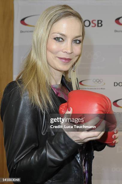 Regina Halmich attends the "Gewalt gegen Frauen - nicht mit uns!" campaign at the representation of North Rhine-Westphalia on March 7, 2012 in...