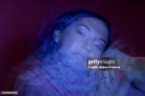 portrait of beautiful woman - neon fluorescent hair stock-fotos und bilder