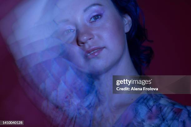 portrait of beautiful woman - neon fluorescent hair stock pictures, royalty-free photos & images