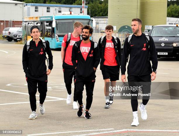 Mohamed Salah, Kostas Tsimikas and Adrian of Liverpool departing for pre season training camp at Liverpool John Lennon Airport on July 21, 2022 in...