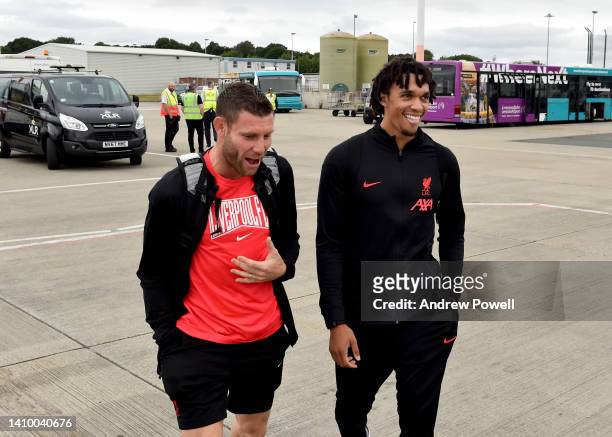 James Milner and Trent Alexander-Arnold of Liverpool departing for pre season training camp at Liverpool John Lennon Airport on July 21, 2022 in...