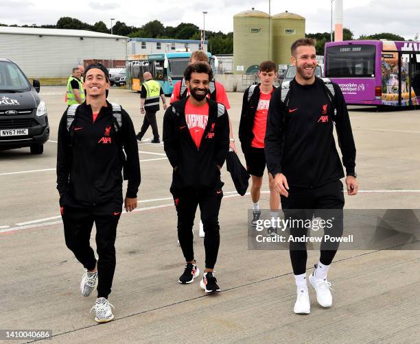 Mohamed Salah, Kostas Tsimikas and Adrian of Liverpool departing for pre season training camp at Liverpool John Lennon Airport on July 21, 2022 in...