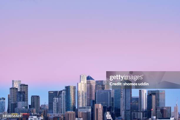 elevated city skyline of london canary wharf at dawn - canary wharf ストックフォトと画像