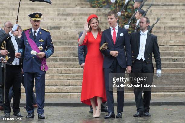 King Philippe of Belgium, Crown Princess Elisabeth of Belgium and Prince Emmanuel of Belgium, members of the Royal family leave after the Te Deum as...