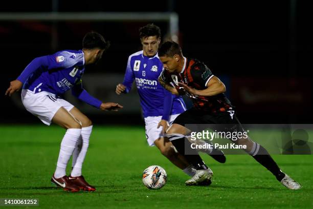 Angel Andres of Armadale FC controls the ball against Jesse Francesca of Modbury Jets FC during the round of 32 Australia Cup match between Armadale...