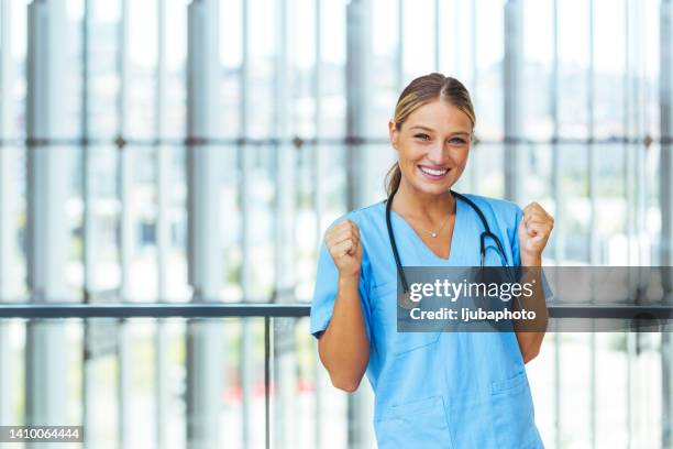 excited beautiful young female nurse - female nurse bildbanksfoton och bilder