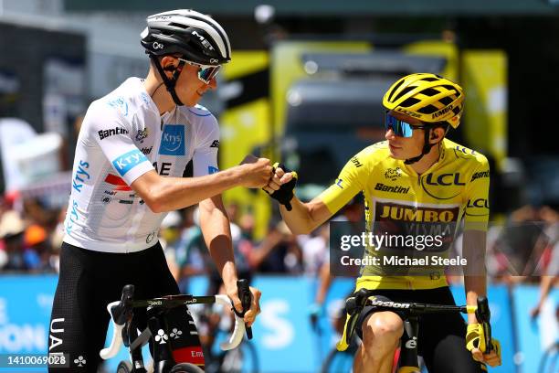 Tadej Pogacar of Slovenia and UAE Team Emirates white best young jersey and Jonas Vingegaard Rasmussen of Denmark and Team Jumbo - Visma Yellow...