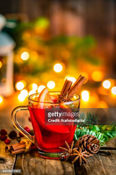 christmas mulled red wine mug or gluhwein on rustic table. copy space - mulled wine stock pictures, royalty-free photos & images