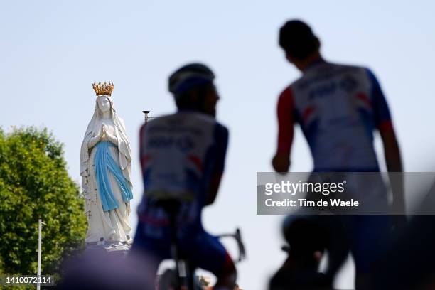 Silhouette of Team Groupama - FDJ and statue of our Lady of Lourdes during the team presentation prior to the 109th Tour de France 2022, Stage 18 a...
