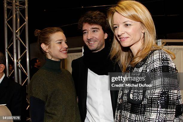 Natalia Vodianova, Antoine Arnault and Delphine Arnault attend the Louis Vuitton Ready-To-Wear Fall/Winter 2012 show as part of Paris Fashion Week on...