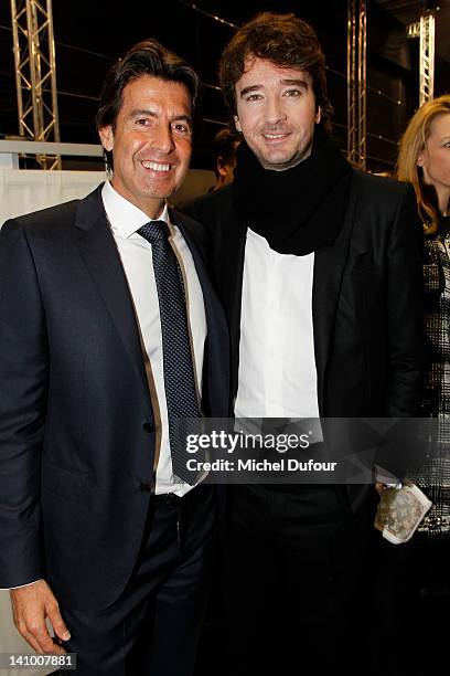 Jordi Constans and Antoine Arnault attend the Louis Vuitton Ready-To-Wear Fall/Winter 2012 show as part of Paris Fashion Week on March 7, 2012 in...