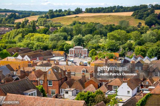 rye railway station and surrounding townscape in rye, east sussex, england - rye sussex stock pictures, royalty-free photos & images