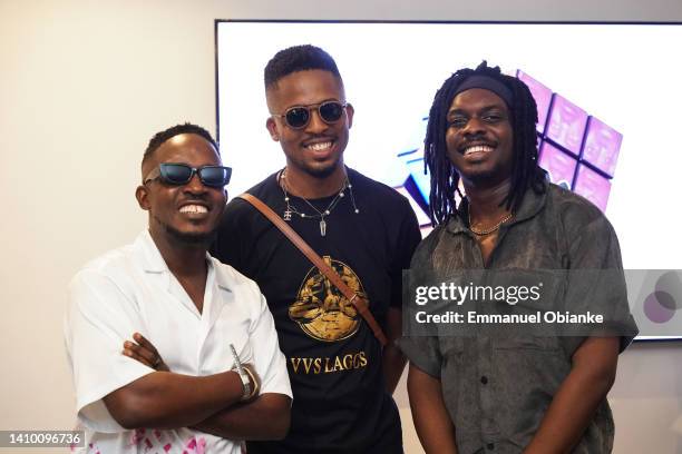 From left to right - M.I, Ifeanyi Nwune and Ken Nwadiogbu at the art exhibition, VVS Lagos on July 16, 2022 in Lagos, Nigeria.