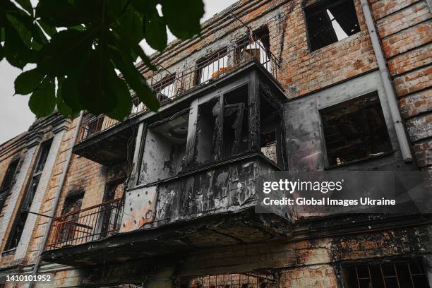 An exterior view of burnt out balcony at destroyed by shelling apartment building on July 19, 2022 in Hostomel, Ukraine. The region around Ukraine’s...