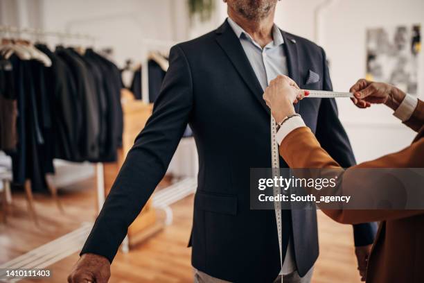 new suit - clothes customization stockfoto's en -beelden