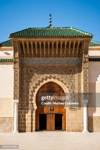 entrance to the mausoleum of moulay ismail, meknes - meknes stock pictures, royalty-free photos & images
