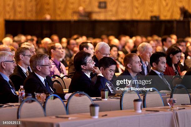 Attendees listen to the morning keynote address at the 2012 CERAWEEK conference in Houston, Texas, U.S., on Friday, March 9, 2012. CERAWEEK, a...