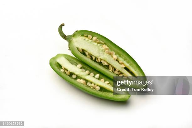 jalapeno pepper cut in half - jalapeno pepper ストックフォトと画像