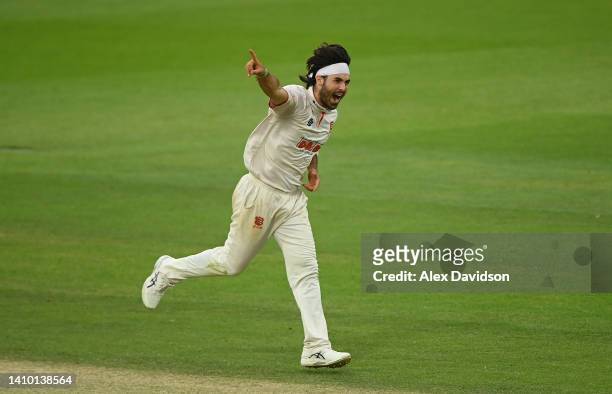 Shane Snater of Essex celebrates taking the wicket of Hashim Amla of Surrey during Day Three of the LV= Insurance County Championship match between...