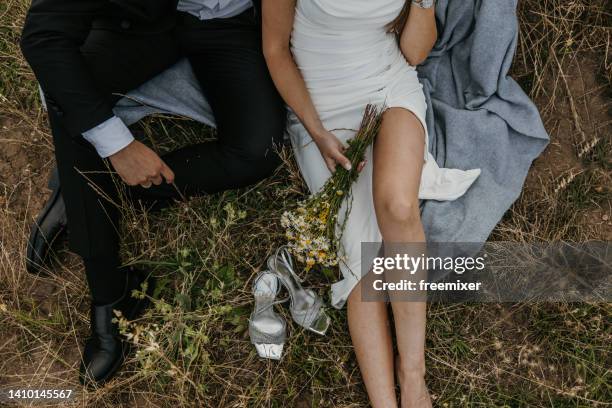 newlywed sitting nature - mens dress shoes stock pictures, royalty-free photos & images