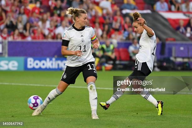 Lina Magull of Germany scores their side's first goal during the UEFA Women's Euro 2022 Quarter Final match between Germany and Austria at Brentford...