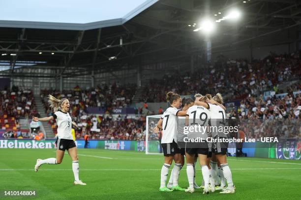 Lina Magull of Germany celebrates with teammates after scoring their team's first goal during the UEFA Women's Euro 2022 Quarter Final match between...